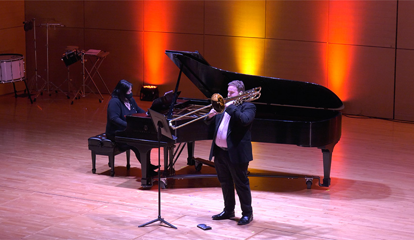 A picture of a trombone student performing in a concert at Central Michigan University.